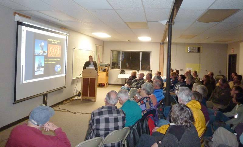 Group of people listening to a public lecture